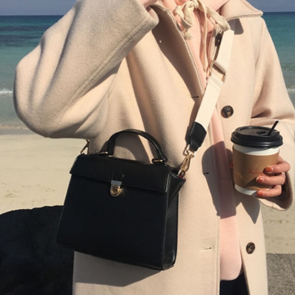 black buckled crossbag